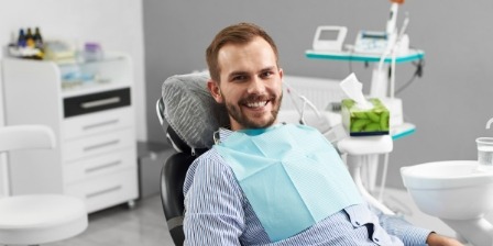 Man smiling in dental chair