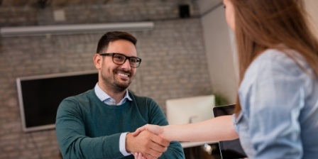 Two people shaking hands