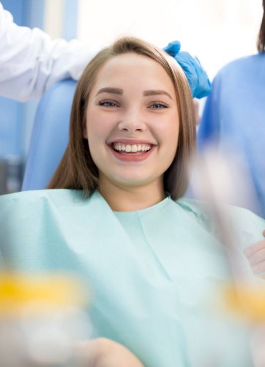 Oklahoma City dental patient grinning in dental chair