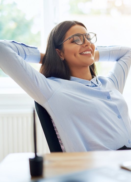 Woman relaxing after sedation dentistry in Oklahoma City