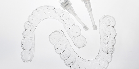 Transparent whitening applicator tubes and trays