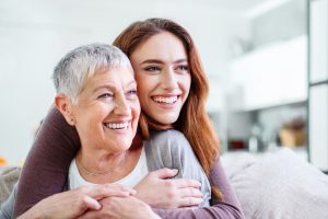 Two smiling women