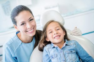 mom and daughter dental visit 