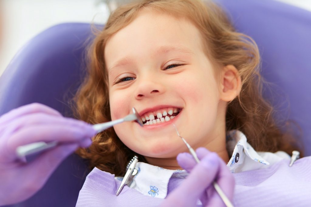 Young girl at kids dentist in OKC